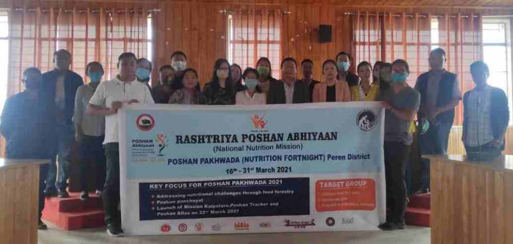 ADC Peren, Mhathung Tsanglao with officials and others during programme on Poshan Pakwada held at DC's Conference Hall, Peren on March 31. (DIPR Photo)